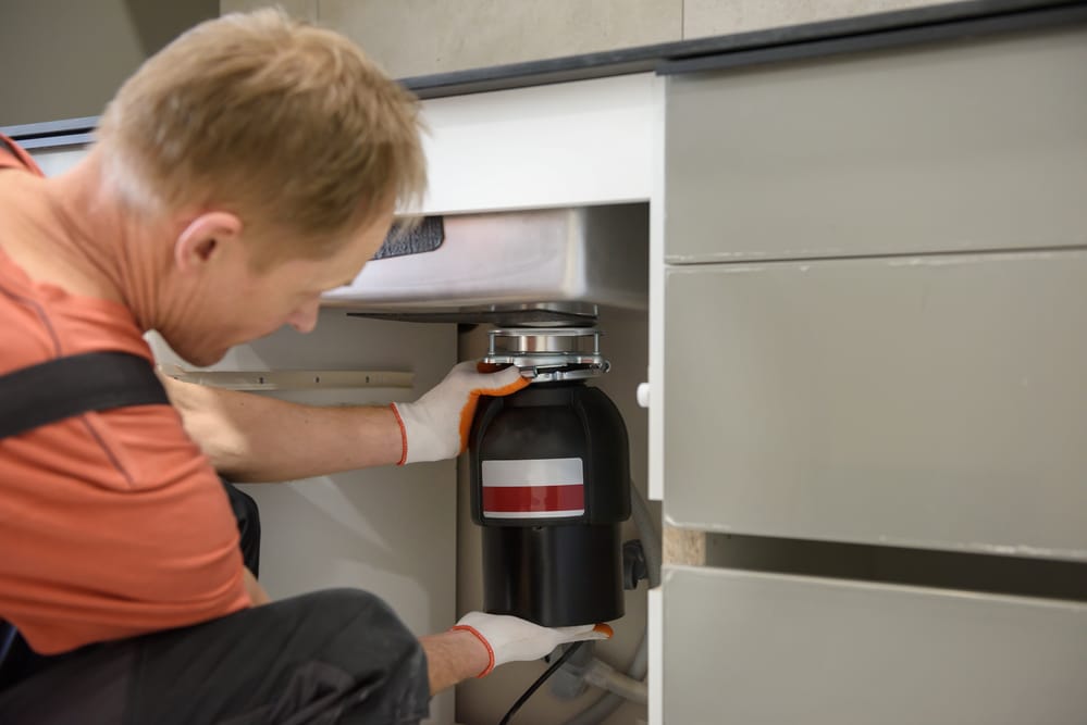 how to install a waste disposal unit