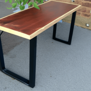A DIY wooden desk with metal stand