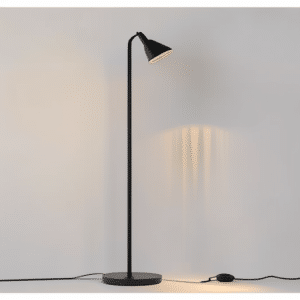 A floor lamp with messy wire on the floor