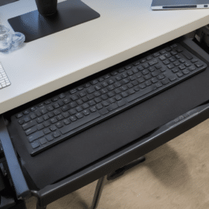Keyboard under a desk