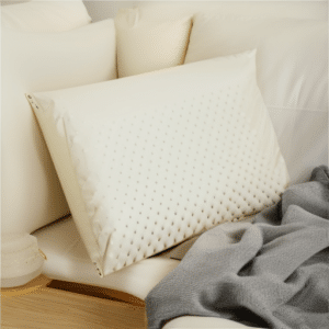 Latex pillow on top of a mattress