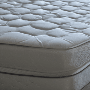 Old white mattress topper
