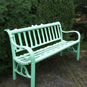 a green chair made of plastic