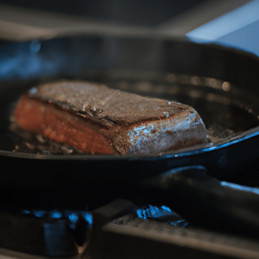 a meat being fried in a pan