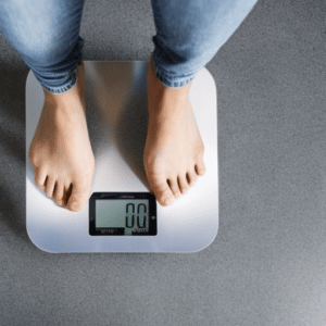 a person obtaining his weight