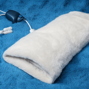 a white blanket on the bed