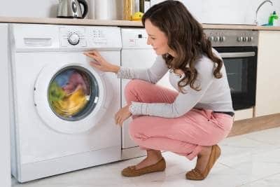 a woman attending to her laundry