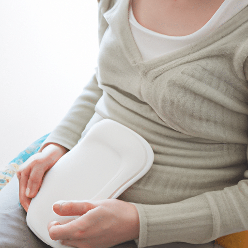 a woman using a heat pad