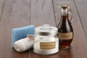 baking soda, cloth, and vinegar
