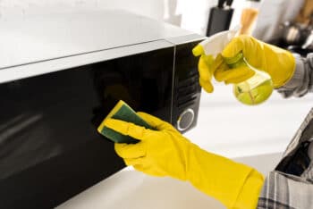cleaning a kitchen appliance