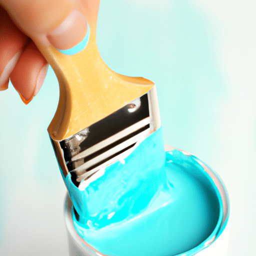 dipping brush in the can of paint