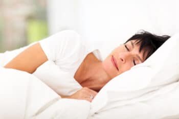 mature woman sleeping on side