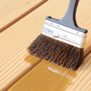 oiling the wood using decking brush