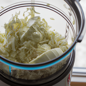 shredded cabbage in a food processor