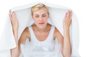 woman inhaling herbal medicine