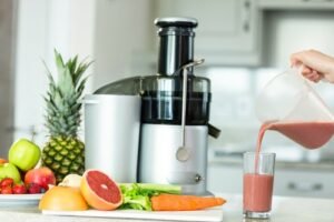 woman pouring juice on glass