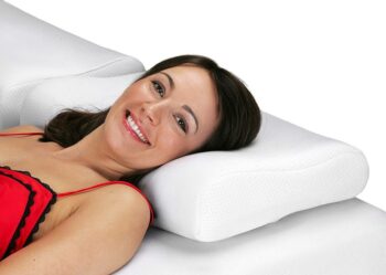 woman smiling while lying on back
