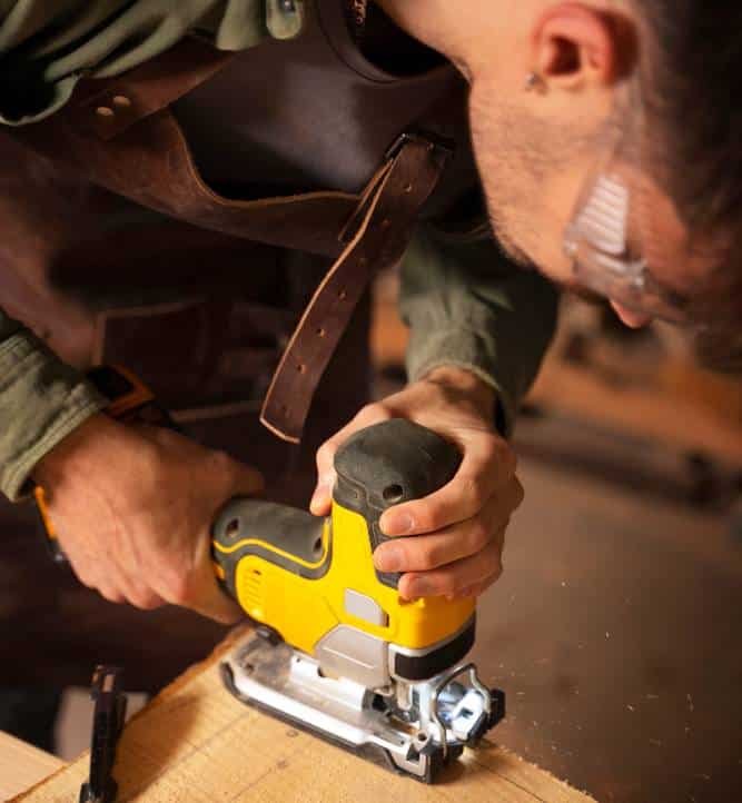 a artisan doing woodcutting high angle
