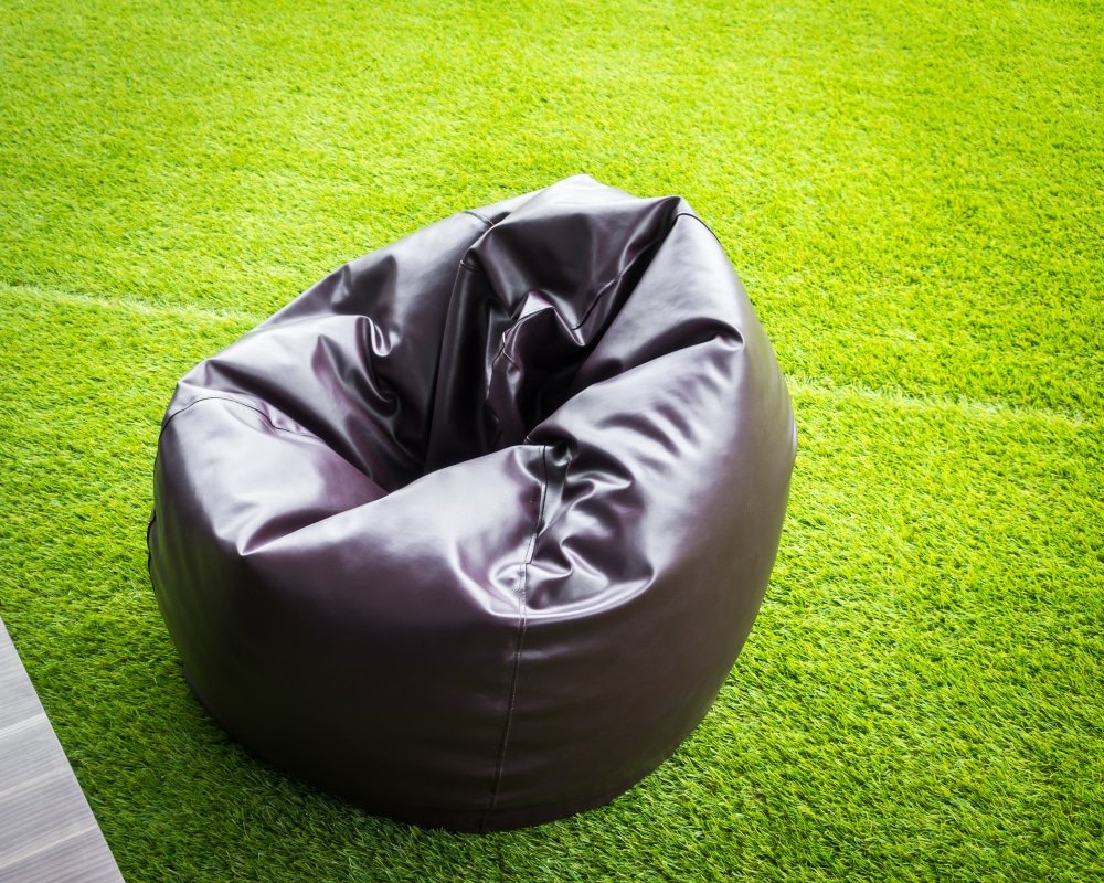 a chair on the fake grass