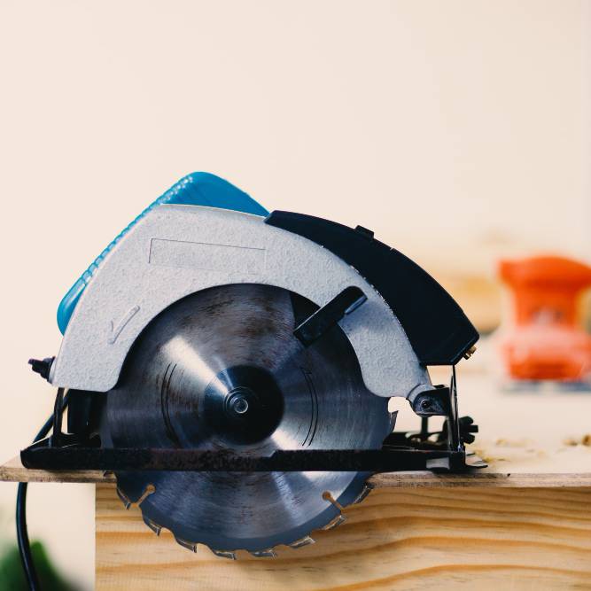 a circular saw on a wooden table