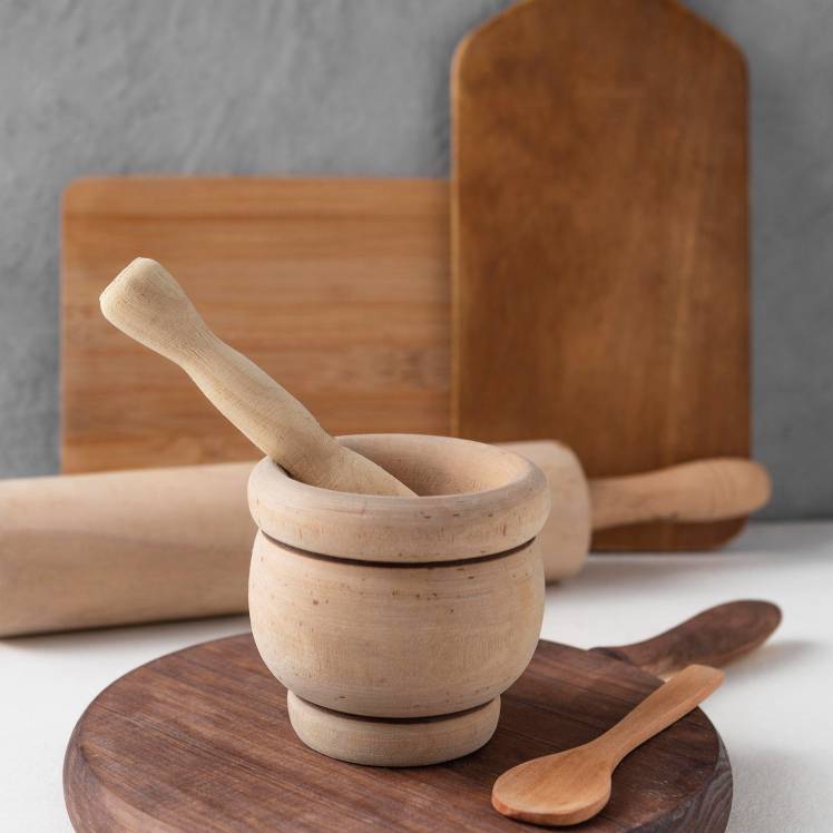 a mortar and pestle on the kitchen countertop