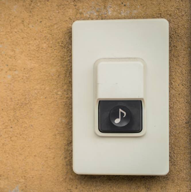 a white wireless door bell