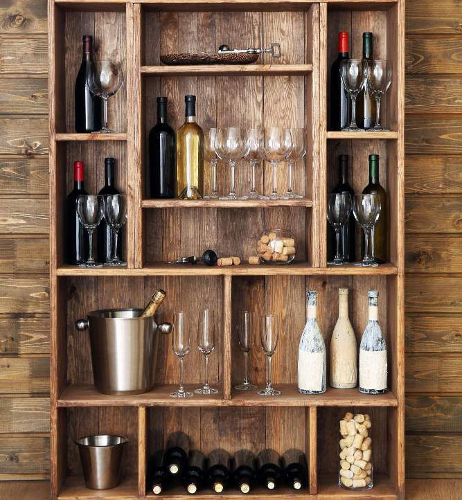 a wine rack with wine bottles