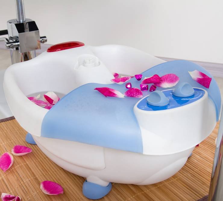 an electric foot spa in the bathroom